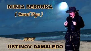 DUNIA BERDUKA   ( Oswal Piga )  Cover USTINOV DAMALEDO