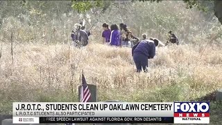 JROTC students help clean up Oaklawn Cemetery