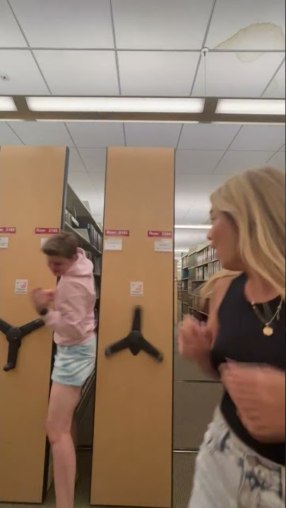 Squeezing Through Closing Library Shelves! #Shorts #FunnyVideos