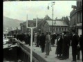 Kristiansund i 1930 viser det yrende livet på kaia og havna.