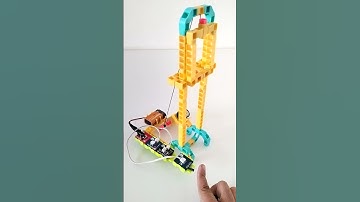 Sensor Controlled Bidirectional Material Elevator using WitBricks and WitBlox.