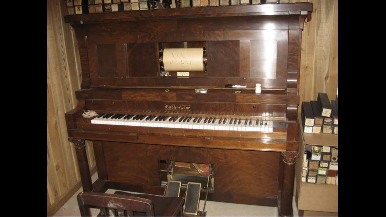 An exemplary 1912 foot pump player piano by Bush & Lane YouTube