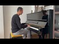 Oscar Pascasio Tenderly Playing The Piano At Home