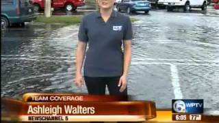Shoppers in areas of Jensen Beach wade to their cars