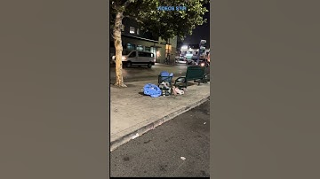 HOMELESS MAN NAPPING IN TRASH CAN