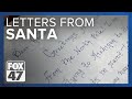 Santas helpers bring handwritten letters directly from the north pole