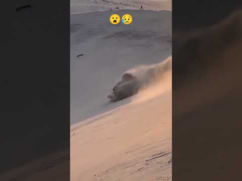Dubai desert safari / big accident of landcruiezer Laying down from mound
