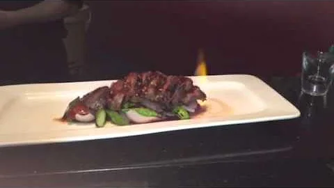Flaming Kobe Beef with Asparagus and onion