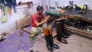 In Pakistan hergestellte lange Stiefel, die weltweit sehr teuer verkauft werden