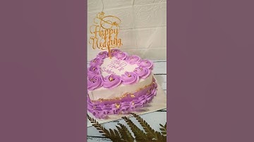 Thumbnail of kue pengantin love ungu simple elegan kekinian viral #shortvideo #short #ungu #wedding #weddingcake