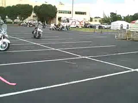 Lynn Phillips doing the figure eight on a Road King