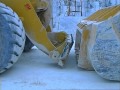 Komatsu WA 600 with LAMETER quick coupler buckets and kit of forks in Carrara marble quarry.