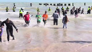 Thousands brave icy waters of Lake Michigan for 26th annual Polar Plunge benefiting Special Olympics