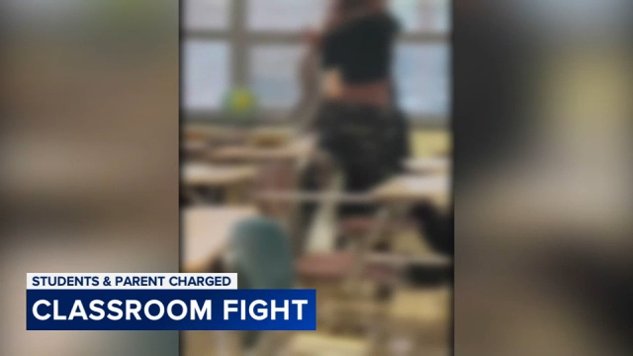 2 students, parent charged after classroom assault