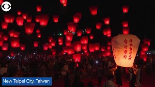Thousands release floating lanterns into sky in Taiwan