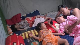 Sweet couple #sweet husband and wife while looking at the phone near their sleeping child