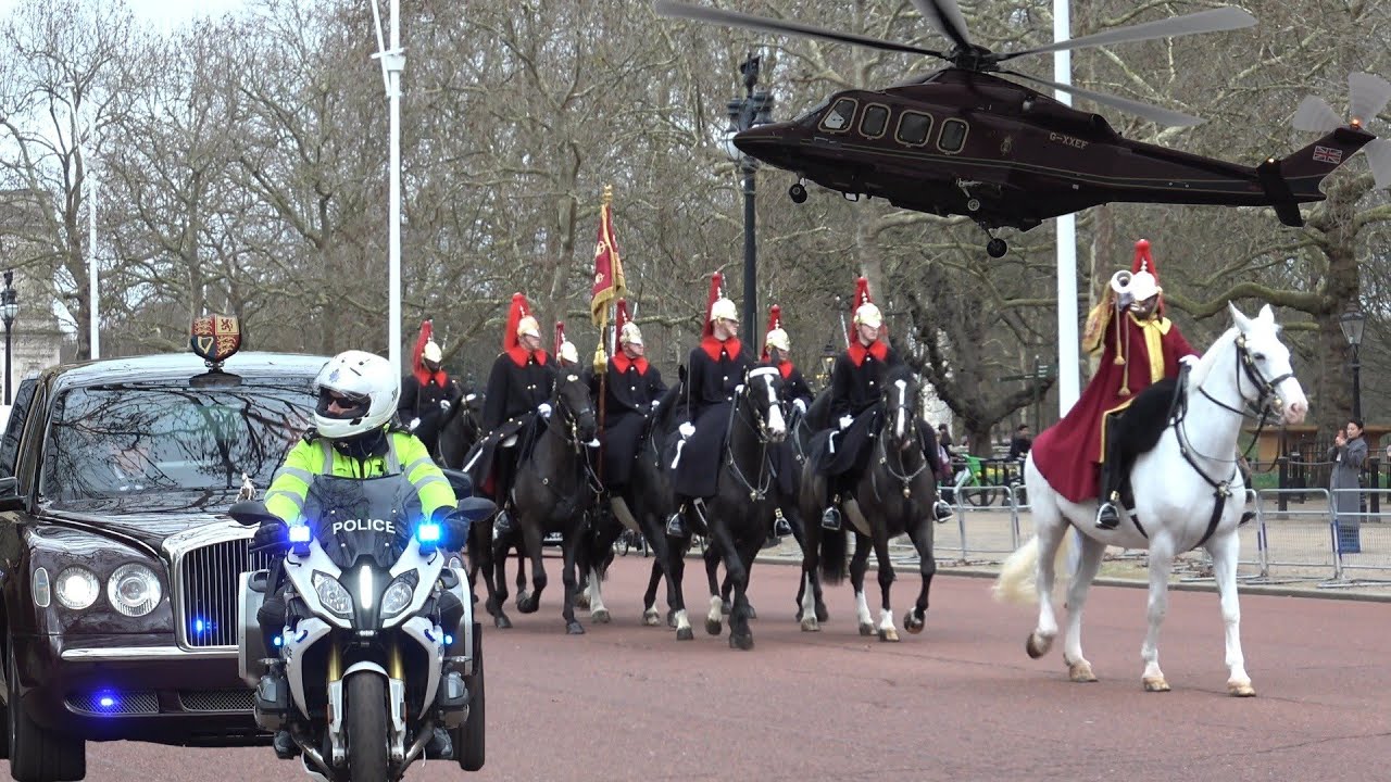 King and queen motorcades leaving Clarence House