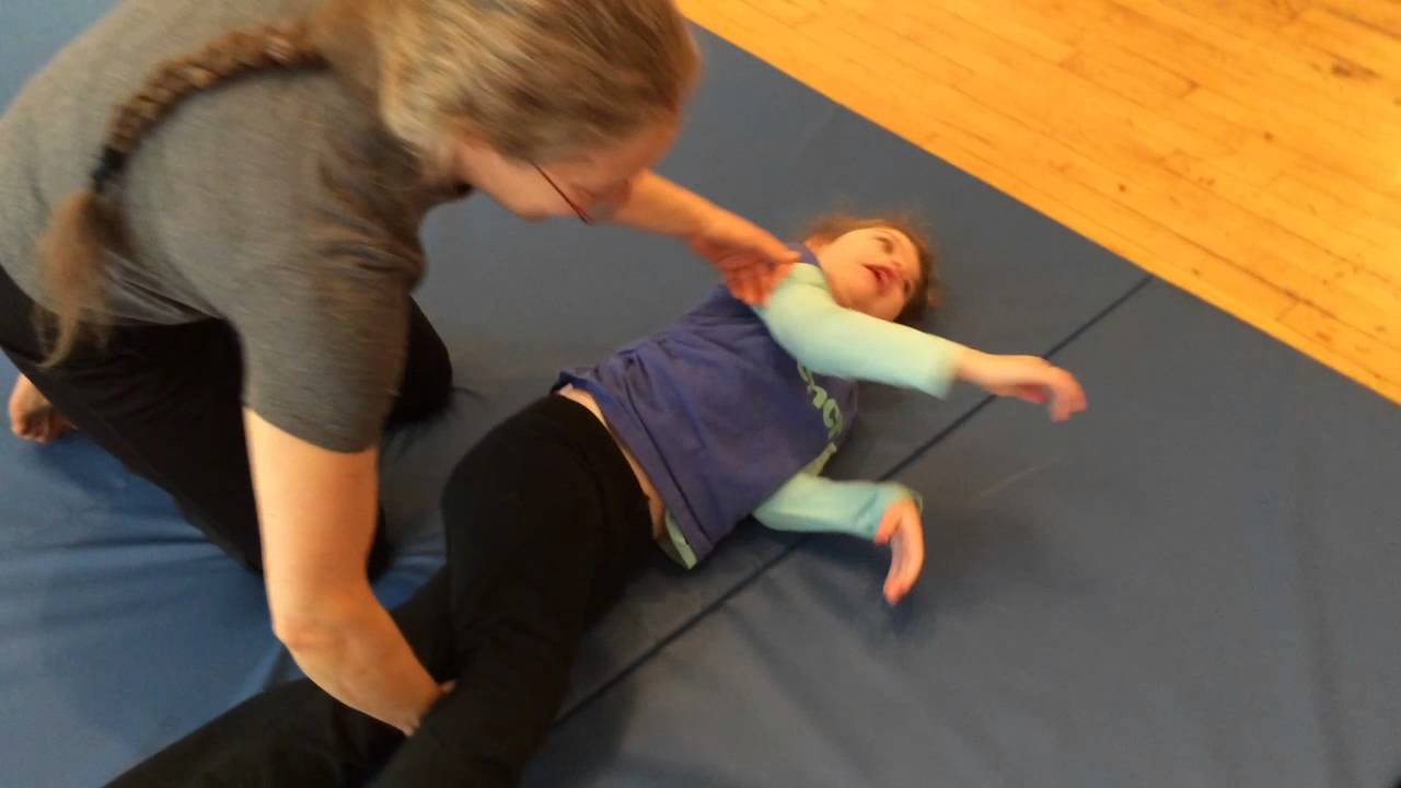 Somatic Re Education Girl With Mild Cerebral Palsy Learns How To Roll