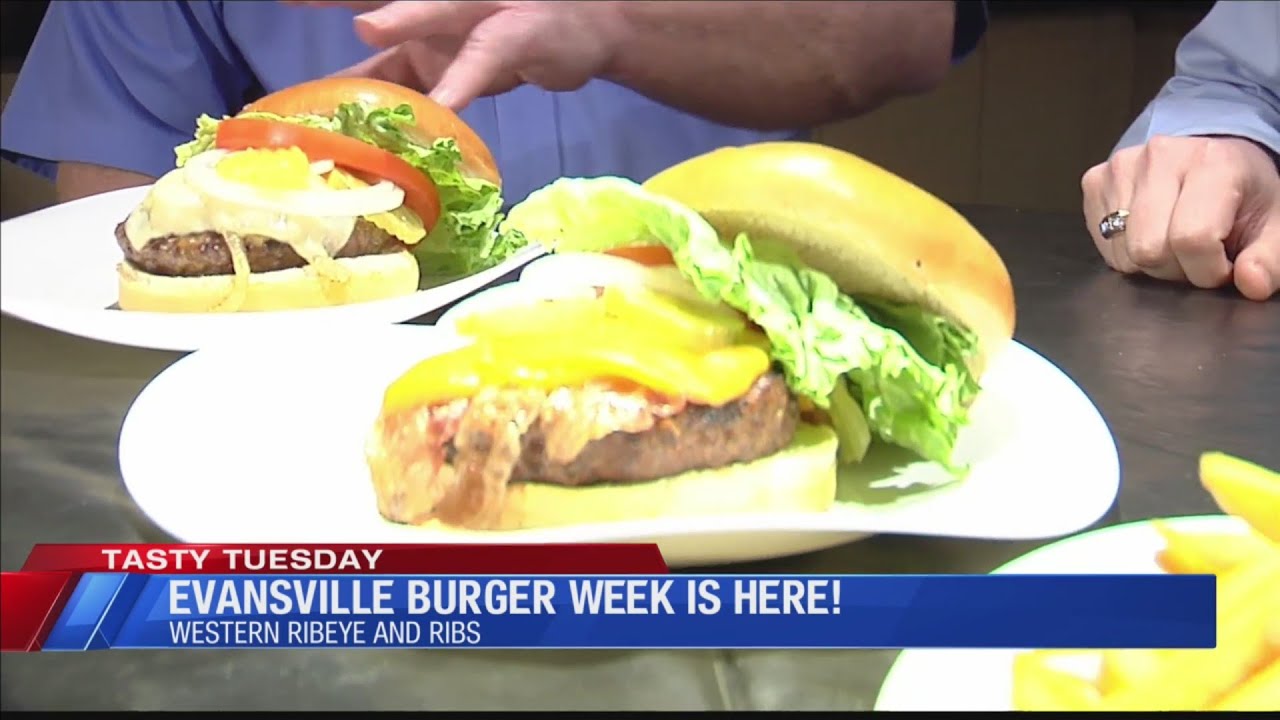 Joe Bird shows off some burgers for Evansville Burger Week in Tasty