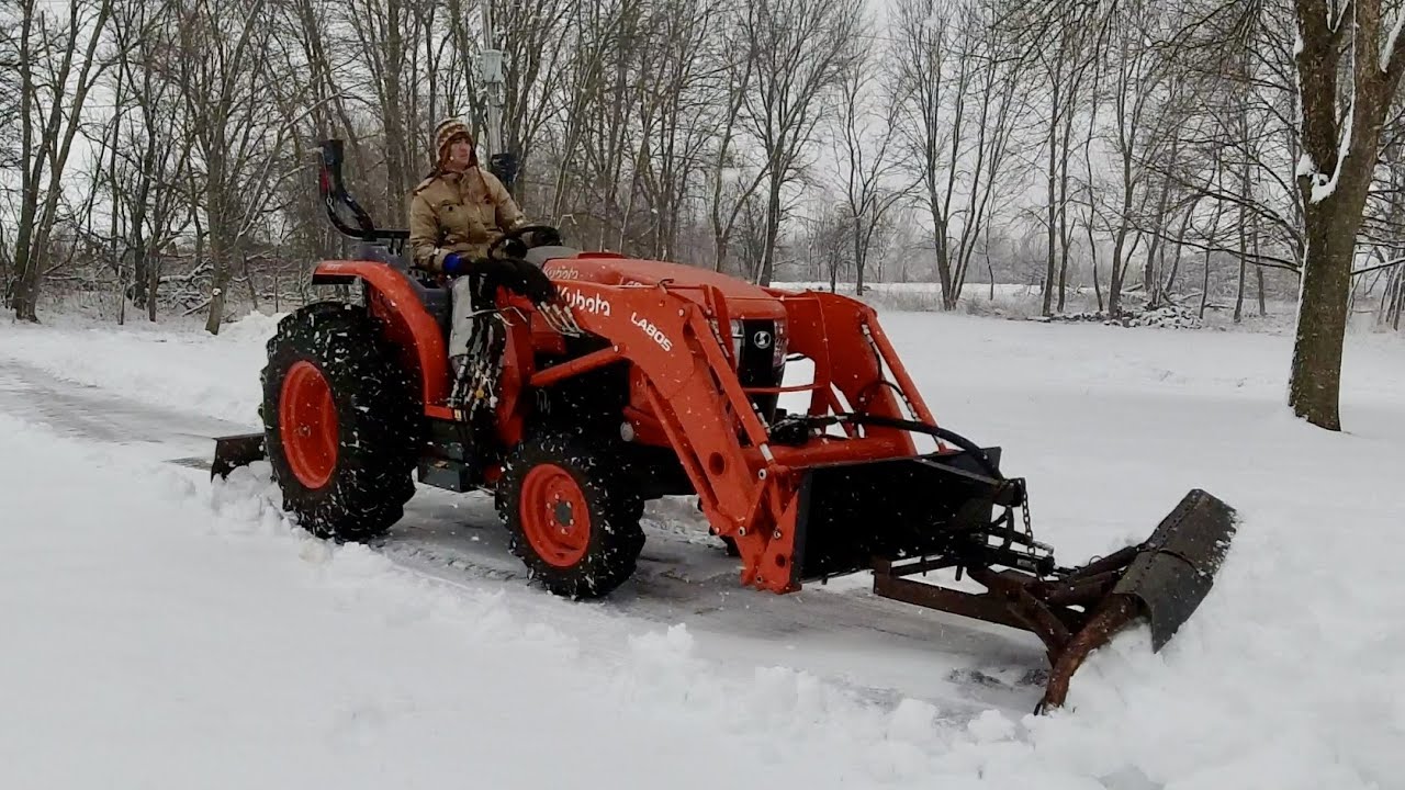 Snowplowing with the Kubota L4060 YouTube