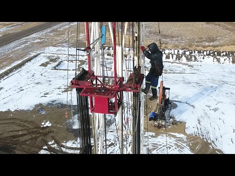 Independent Well Servicing Service Rig Running Rods And Tubing In The Bakken At Stoughton Sask 
