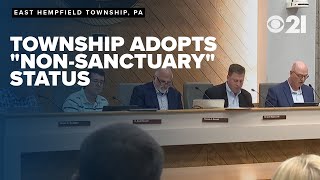 Township adopts 'non-sanctuary' status despite pushback