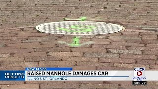 Manhole cover damages woman's car