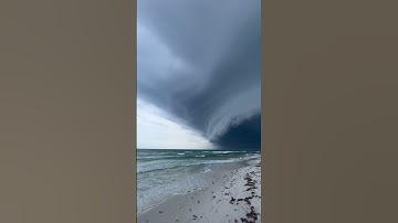 Beautiful Dark Storm Covers Beach Horizon || ViralHog