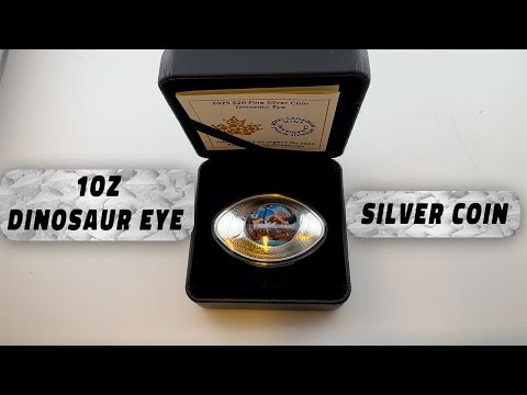 عملة فضية على شكل عين ديناصور من كندا وزنها أونصة واحدة عام ٢٠٢٥