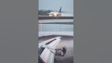 Dual View Of B737-200 Landing With Thrust Reversers Activated