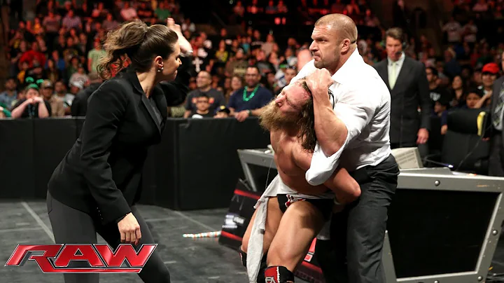 Triple H and Stephanie McMahon go after a handcuff...