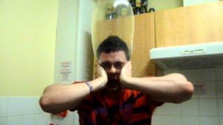 Joe Blowing A Condom Up On His Head