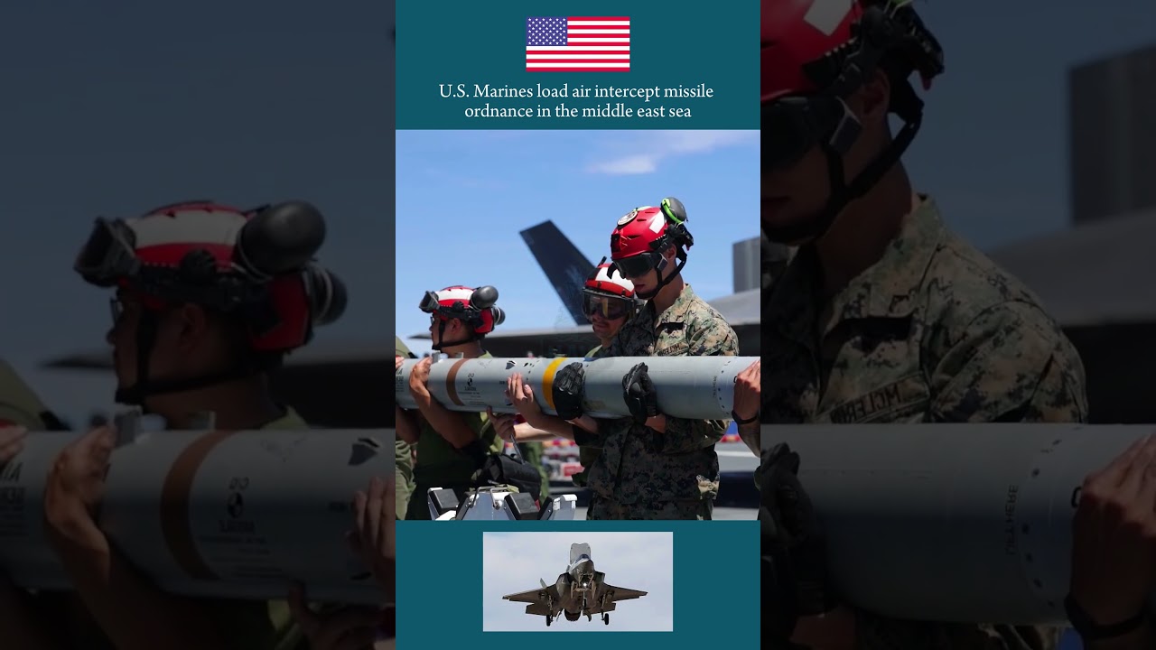 U.S. Marines load air intercept missile on F-35