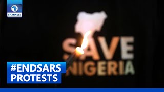 Full Video: #EndSARS Protesters Hold Candlelight Procession In Abuja