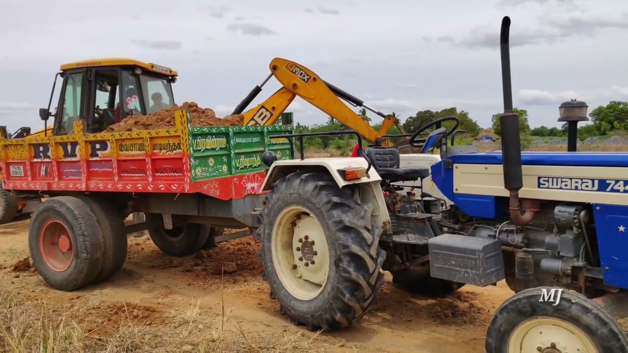 JCP and Tractor Videos / JCB stunt with Swaraj 744 FE stuck loaded trolley pulling / CFV