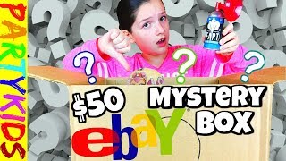 Today, I bought a $50 eBay mystery box and opened it on camera! Watch us do the eBay mystery box unboxing to see what