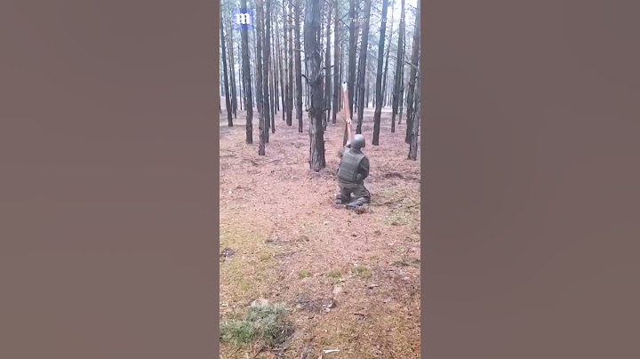 Russian soldier hits mine with stick and nearly gets his head blown off