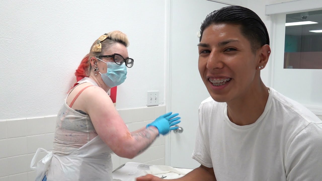 Bryan Tries To Guess Our Sign...:)  Tommy T's Body Piercing Huntington Beach, CA