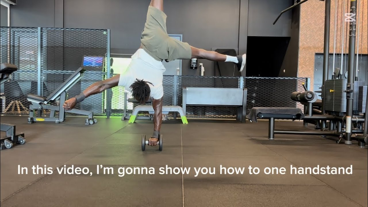 How to one arm hand stand on dumbbells watch till the end 