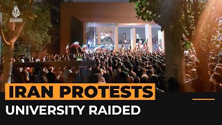 Security forces raid Iran university after protests