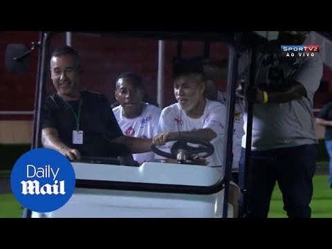 Robinho feigns injury so Neymar can drive buggy around the pitch - Daily Mail