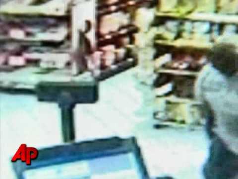 Man Hits Armed Robber With Beer Bottle