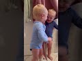 Adorable Twins Play Peekaboo Behind the Curtains