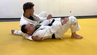 Reverse half guard.  2 sweep, 2 submissions options.