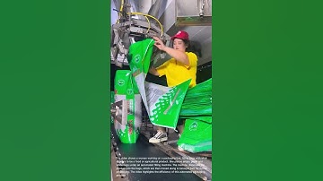 Efficient Food Packaging: Woman Operates Automated Filling Line