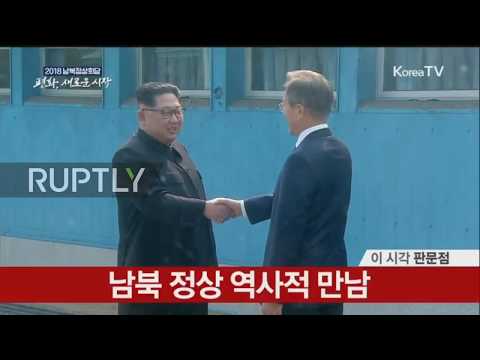 Korean DMZ: Kim Jong-un and Moon Jae-in shake hands ahead of historic summit