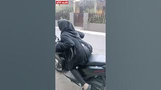 ASTI AGAIN WEARS LATEX LEGGINGS WHILE ROOTING ON A BEAT MOTORCYCLE