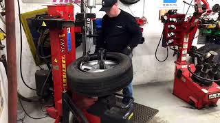 Changing Tires at Kenwood Tire & Auto Service Using a Corghi 500 Tire Machine