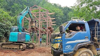 Car, excavator Transport support, building a wooden stilt house do homestay.