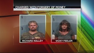 2 arrested after APD find printer, counterfeit money